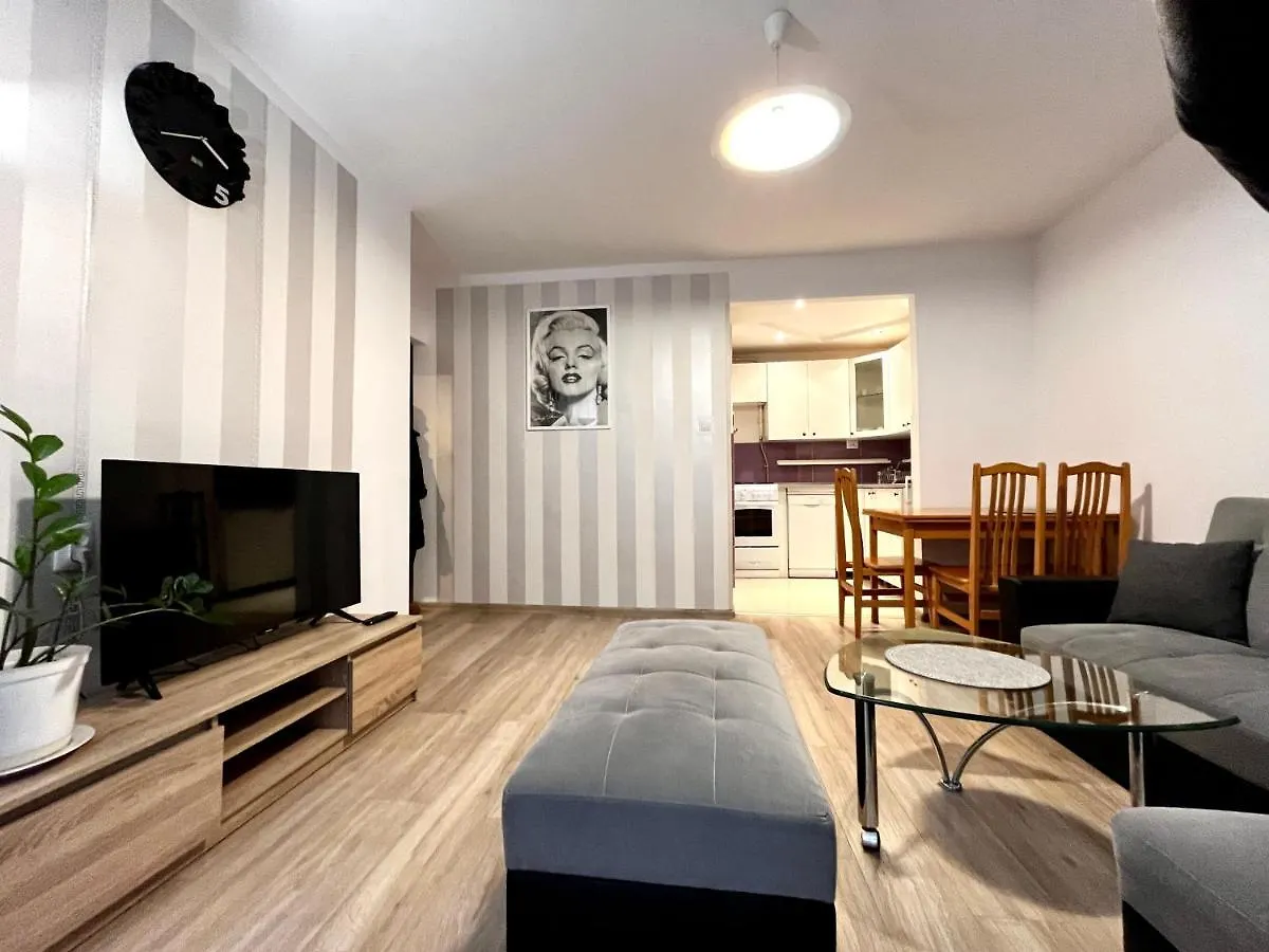 Charmig Apartment contacts